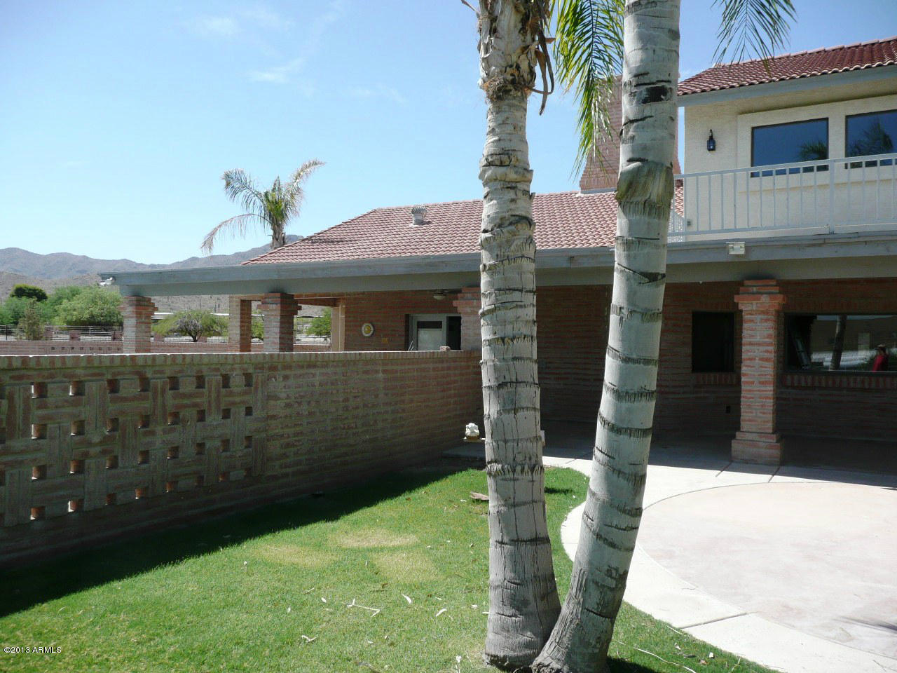 4128 West Elliot Road Laveen, AZ 85339 - Photo 32 of 114 a front view of a house with garden