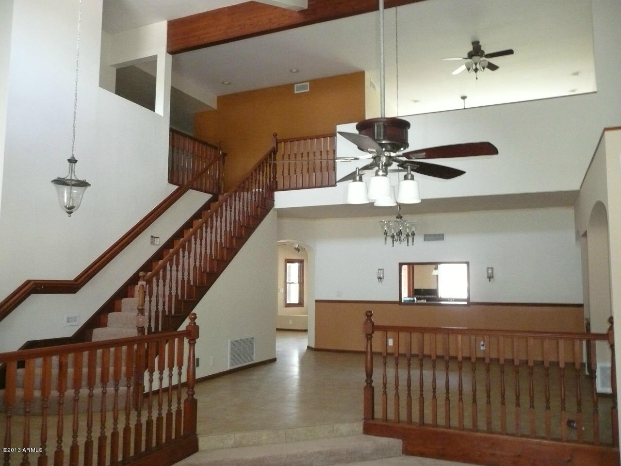 4128 West Elliot Road Laveen, AZ 85339 - Photo 54 of 114 a view of entryway and hall with wooden floor