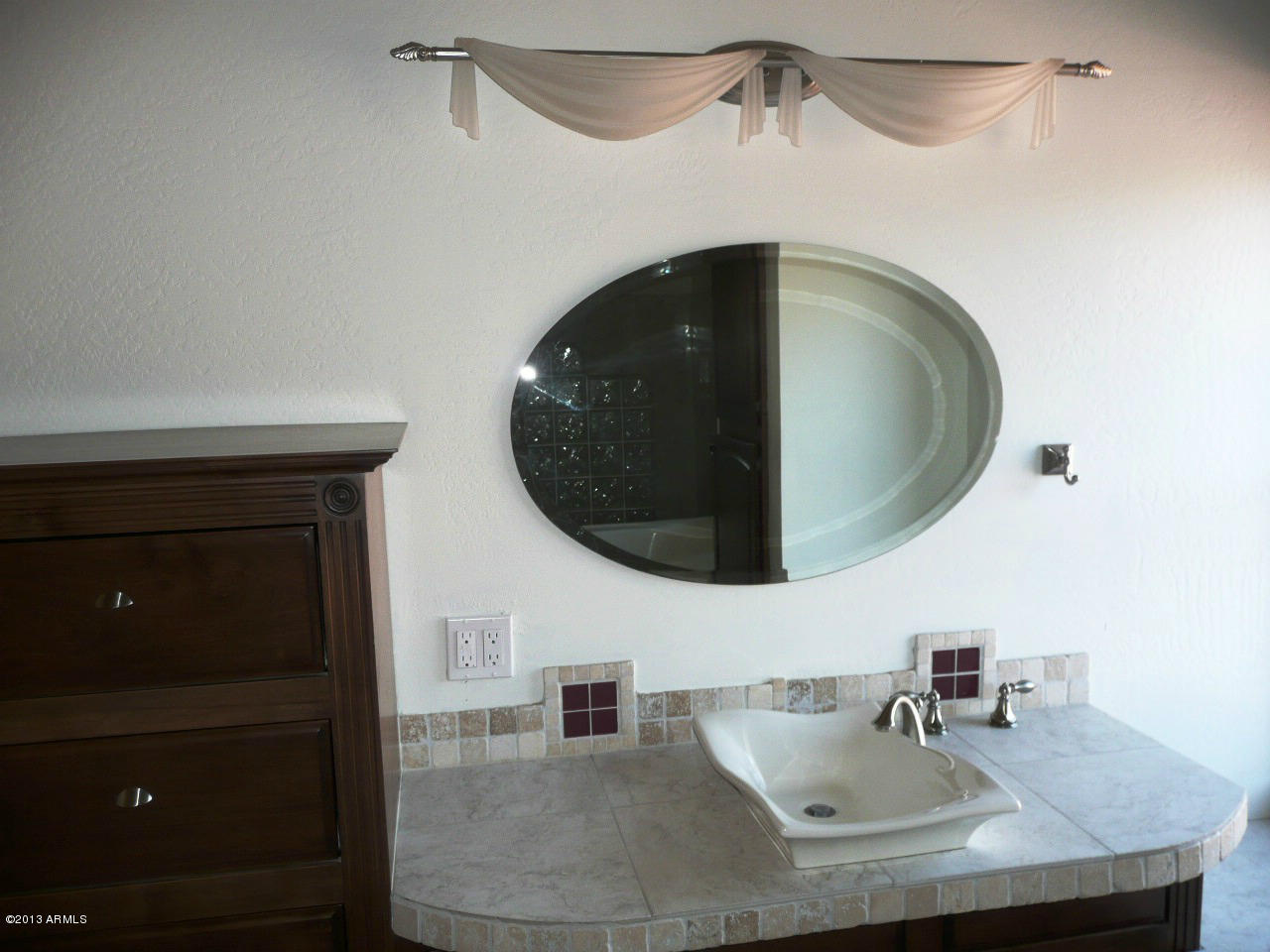4128 West Elliot Road Laveen, AZ 85339 - Photo 60 of 114 a bathroom with a sink and a mirror