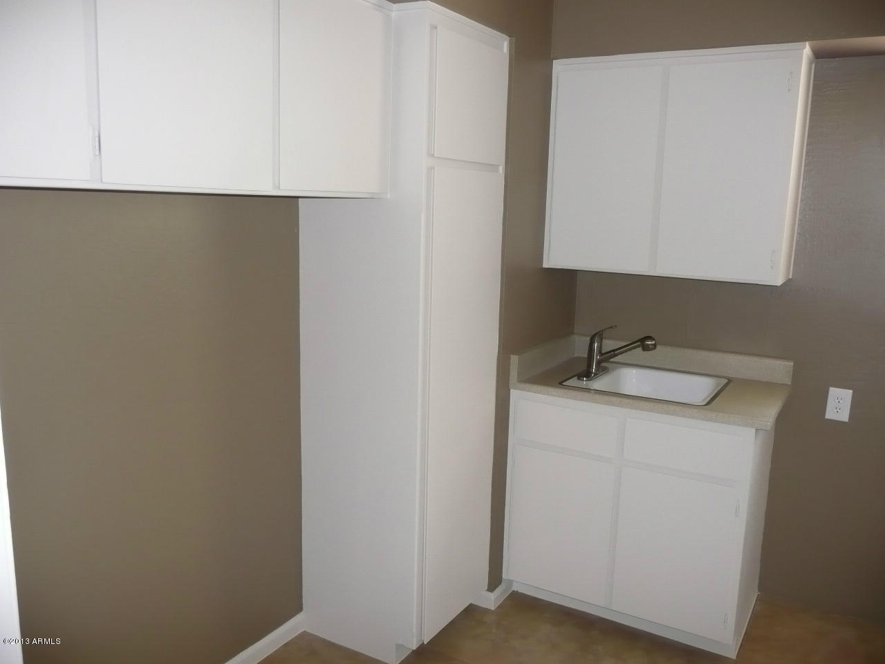 4128 West Elliot Road Laveen, AZ 85339 - Photo 99 of 114 a bathroom with a sink and a mirror