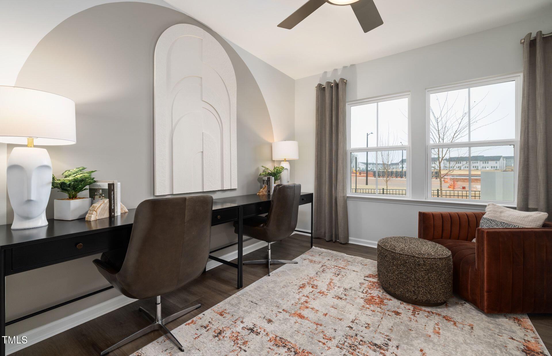 457 Grange Farm Place Raleigh, NC 27603 - Photo 14 of 30 a workspace with furniture and a window