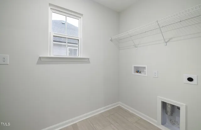 a view of a room that has a window in it