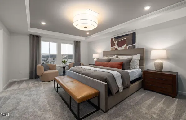 a bedroom with bed and window