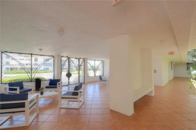 a kitchen with a sink cabinets and window