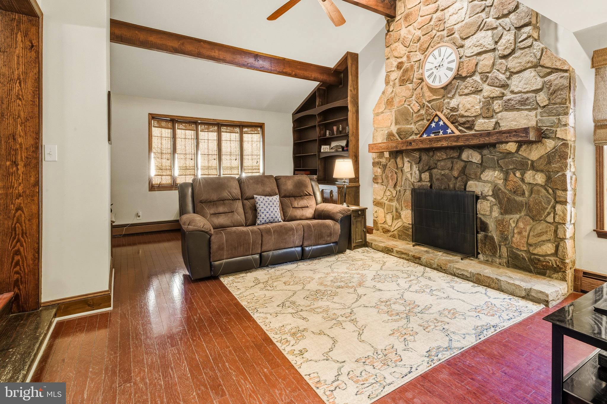 335 2nd Avenue Lindenwold, NJ 08021 - Photo 13 of 32 a living room with furniture and a rug