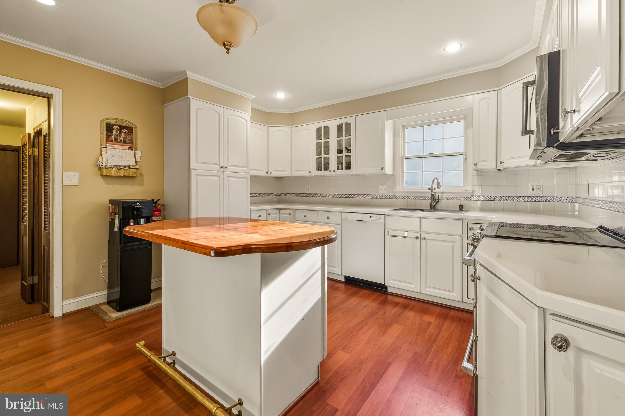 335 2nd Avenue Lindenwold, NJ 08021 - Photo 18 of 32 a kitchen with stainless steel appliances granite countertop a sink stove and refrigerator