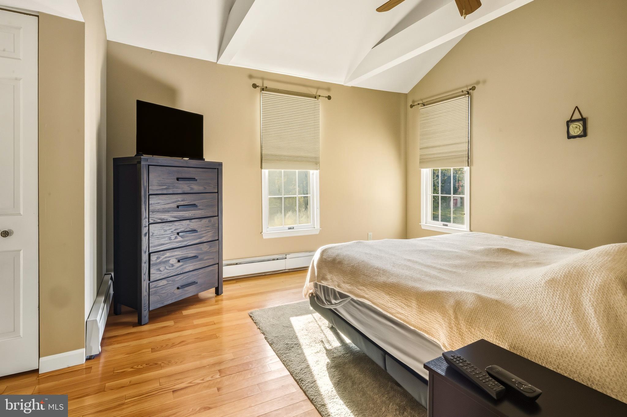 335 2nd Avenue Lindenwold, NJ 08021 - Photo 20 of 32 a bedroom with a bed and flat screen tv