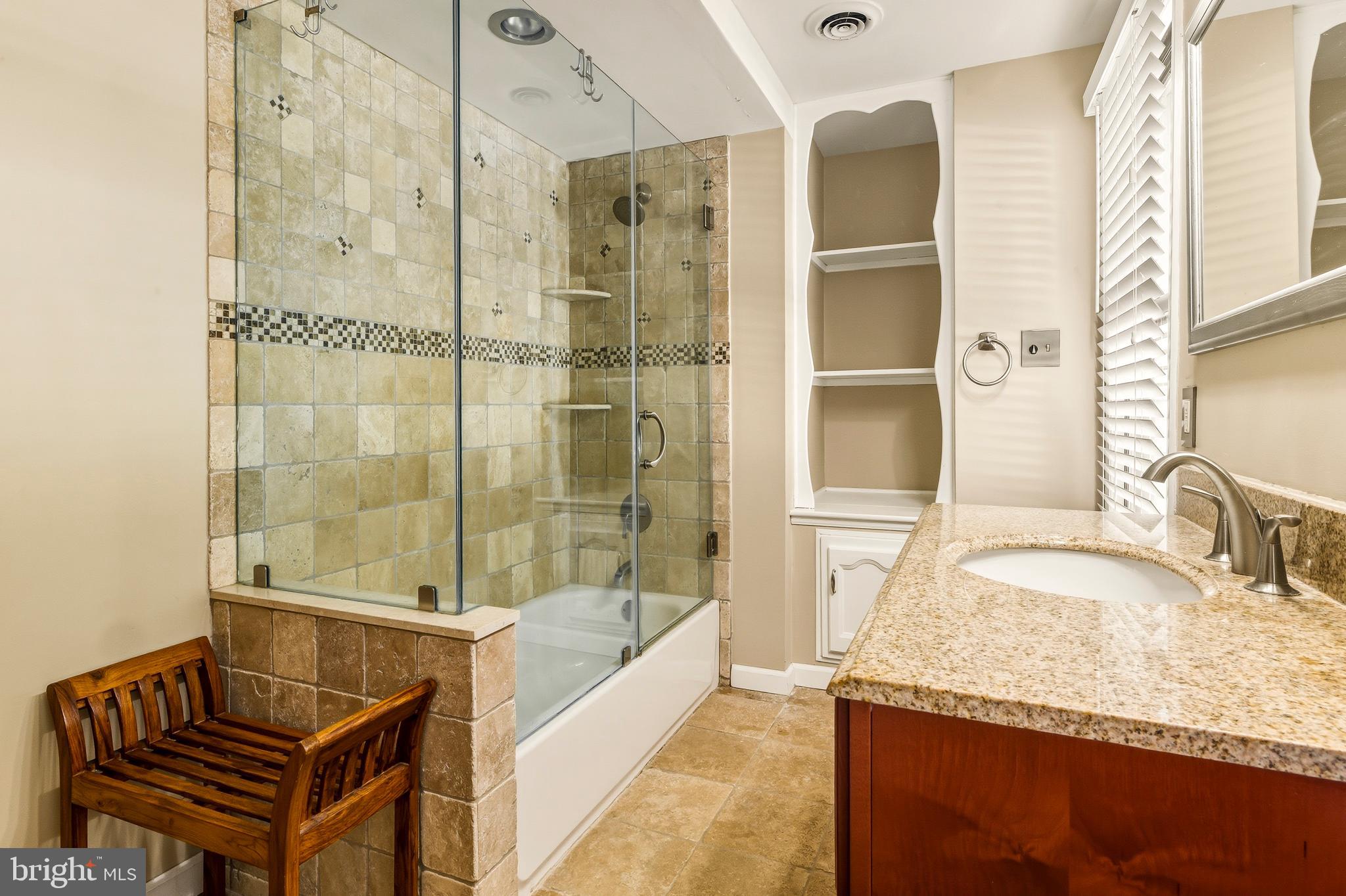 335 2nd Avenue Lindenwold, NJ 08021 - Photo 22 of 32 a bathroom with bathtub a shower and a sink