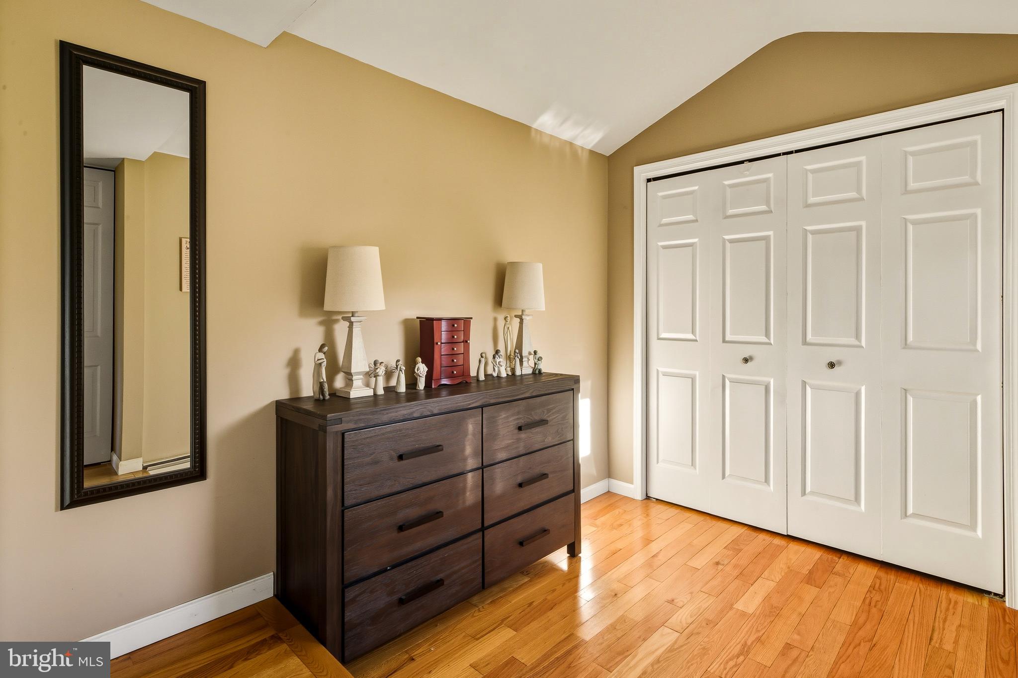 335 2nd Avenue Lindenwold, NJ 08021 - Photo 23 of 32 a bed room with a bed and a mirror