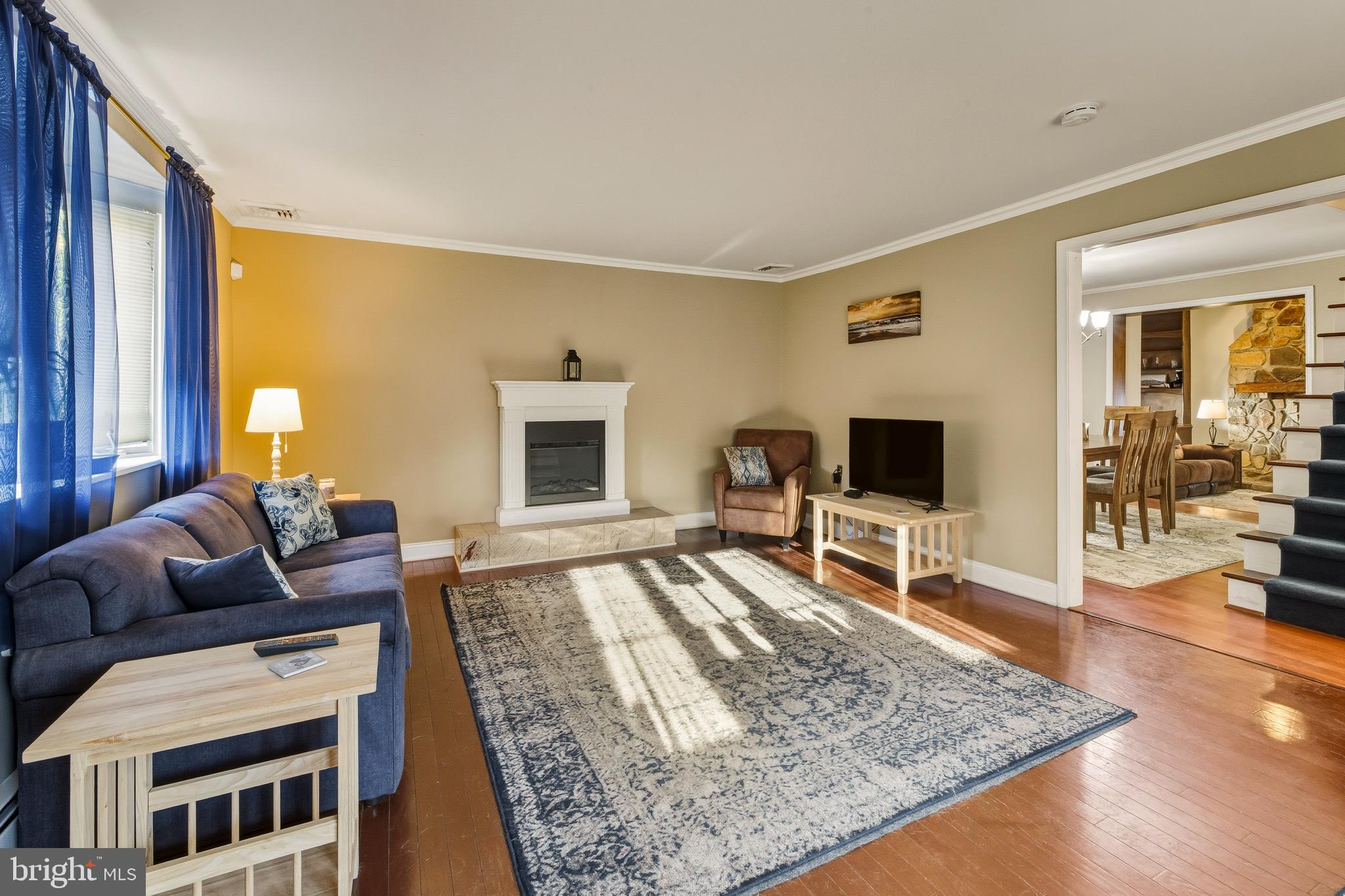 335 2nd Avenue Lindenwold, NJ 08021 - Photo 5 of 32 a living room with furniture and a flat screen tv