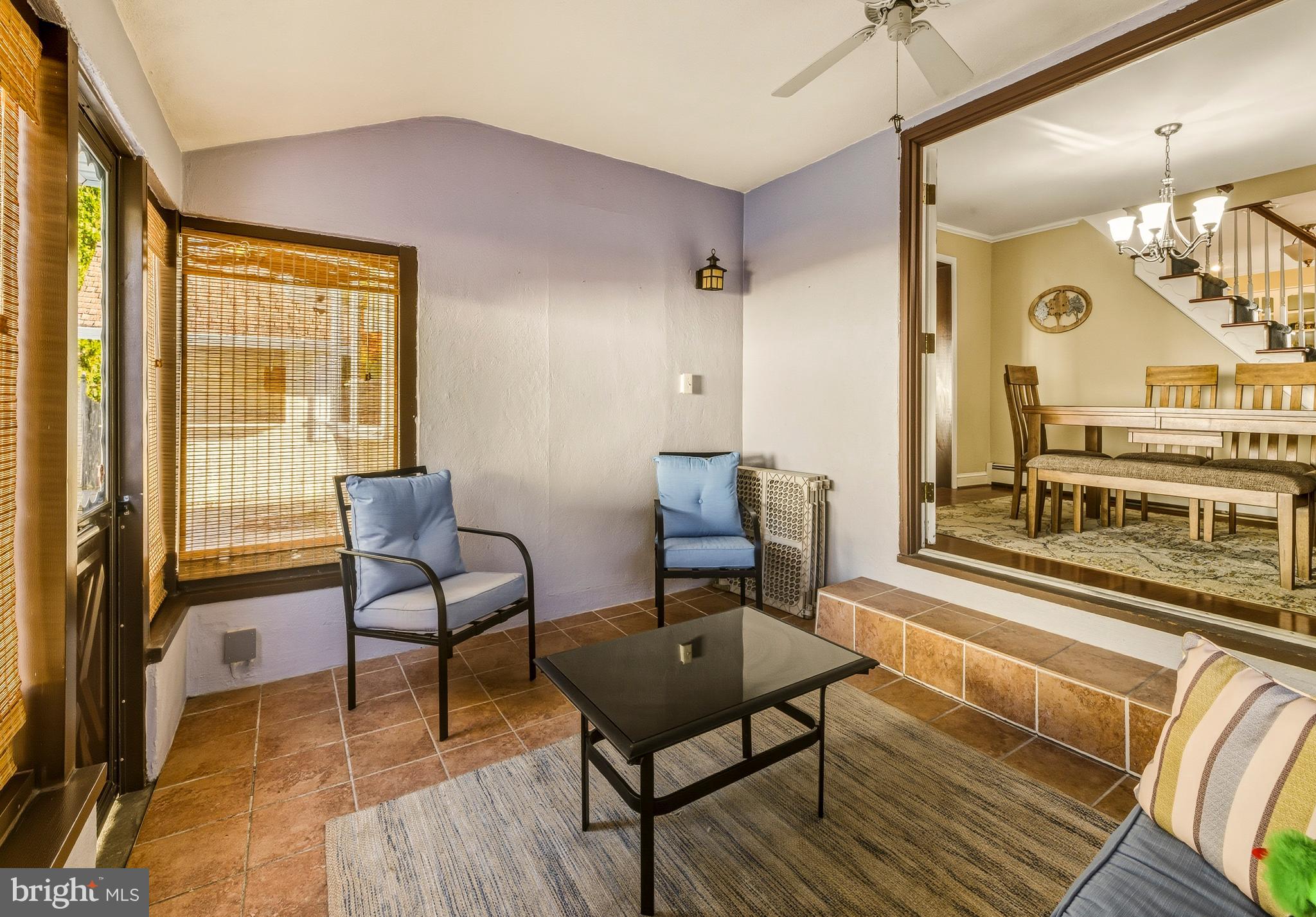 335 2nd Avenue Lindenwold, NJ 08021 - Photo 9 of 32 a living room with furniture and a floor to ceiling window