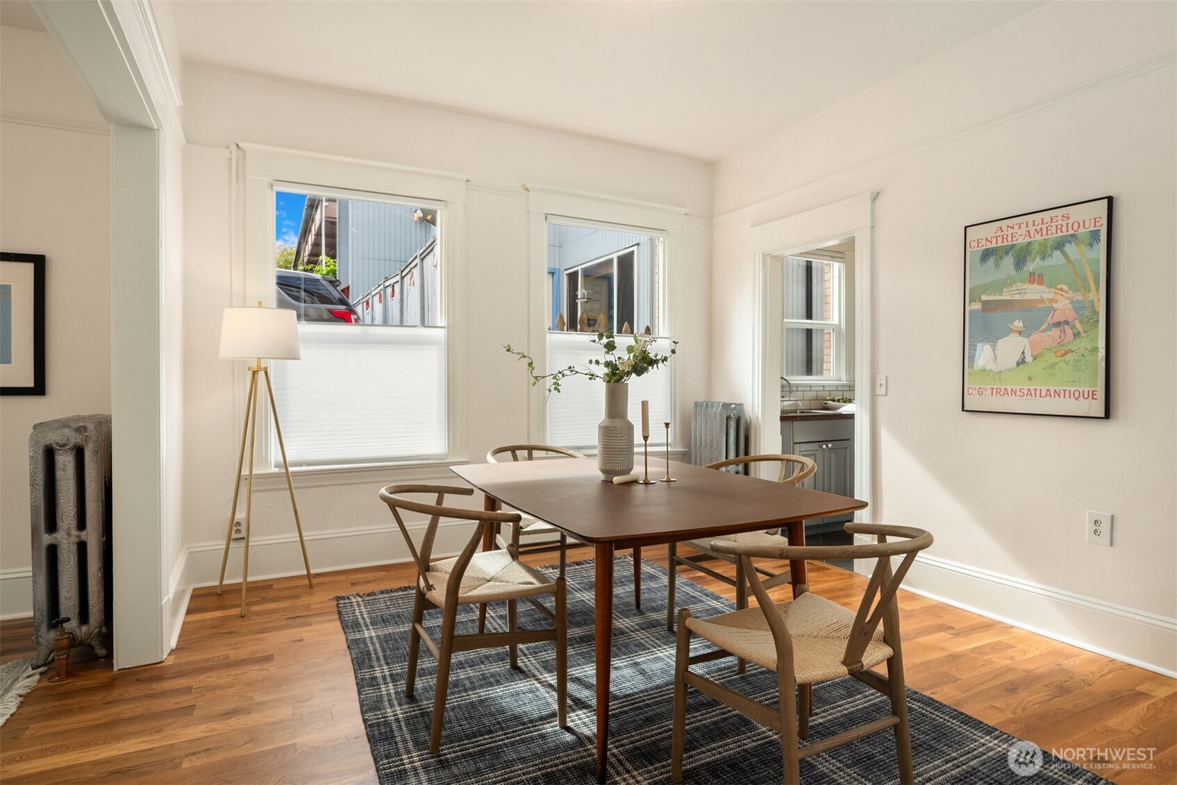 1726 15th Avenue, Unit 7 Seattle, WA 98122 - Photo 12 of 24 a view of a dining room with furniture and wooden floor