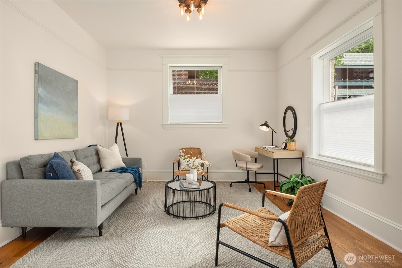 1726 15th Avenue, Unit 7 Seattle, WA 98122 - Photo 14 of 24 a living room with furniture and a window