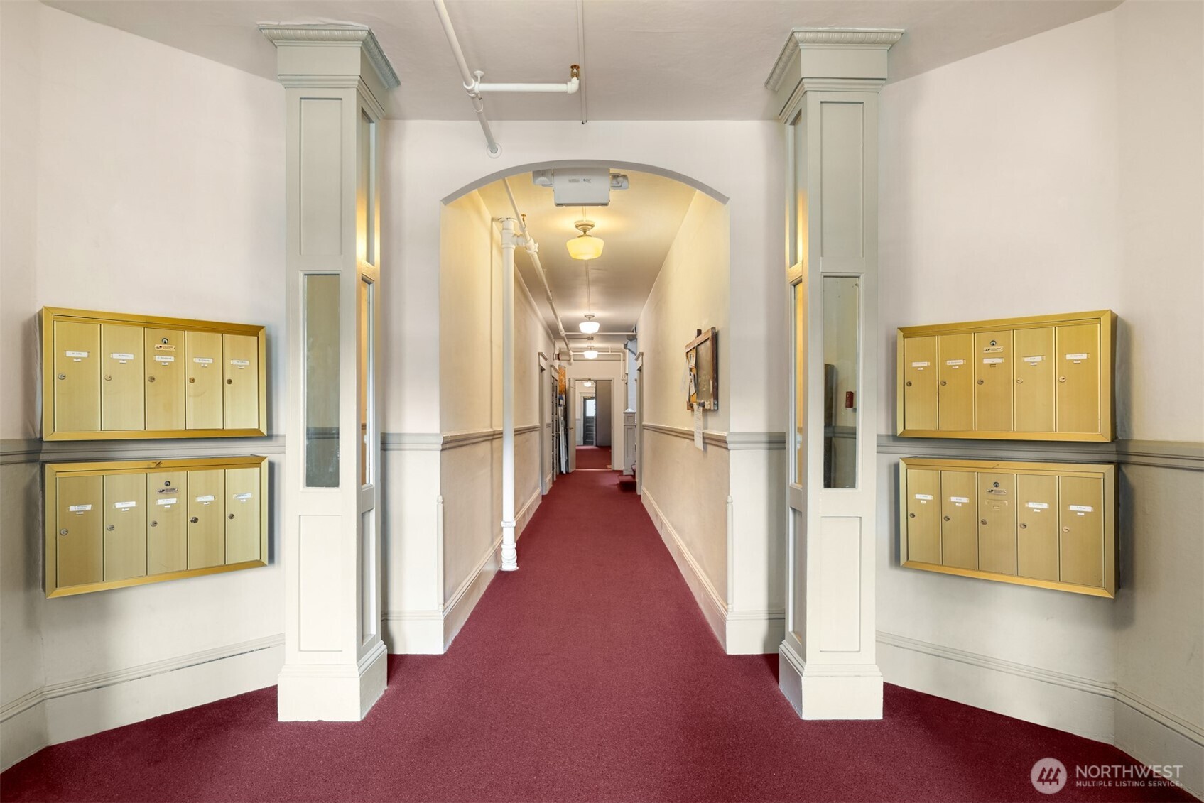 1726 15th Avenue, Unit 7 Seattle, WA 98122 - Photo 4 of 24 a view of a hallway view with wooden floor and staircase