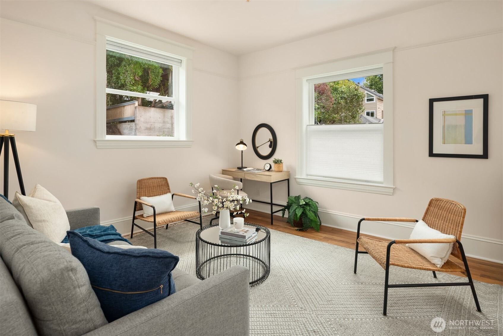 1726 15th Avenue, Unit 7 Seattle, WA 98122 - Photo 8 of 24 a living room with furniture and a window