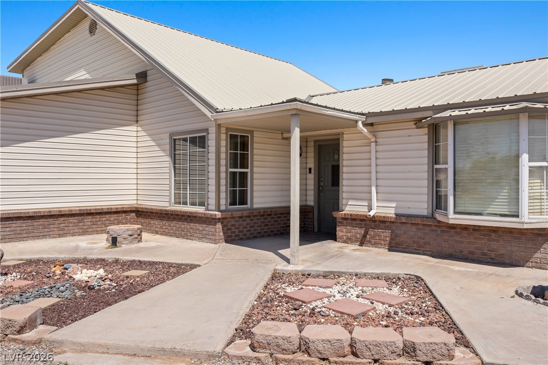 750 Leming Avenue Overton, NV 89040 - Photo 8 of 82 This charming home offers a welcoming facade with durable siding and a clean, accessible entrance.