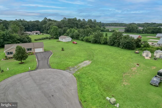 a view of a backyard with outdoor space