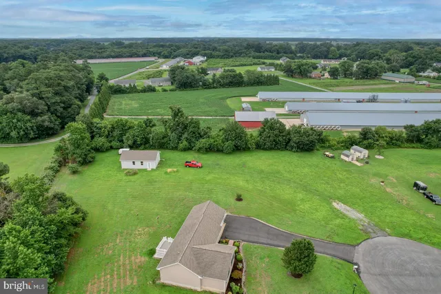 an aerial view of a golf course with a yard