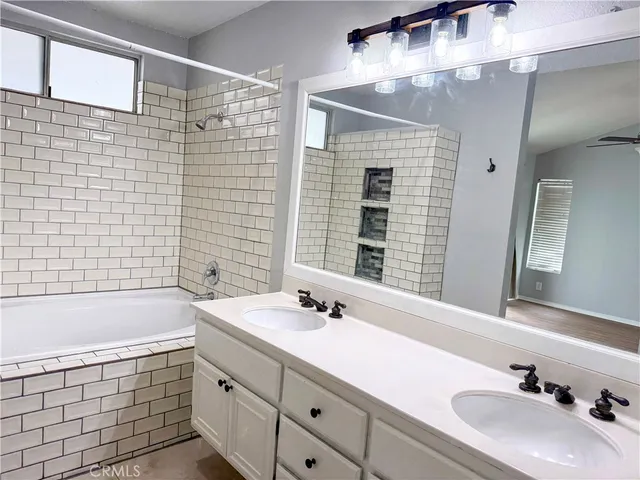 a bathroom with a sink and a bathtub
