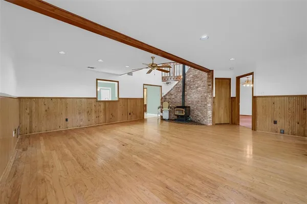 a view of a livingroom with wooden floor