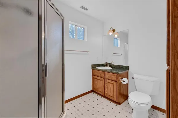 a view of a hallway with a fan