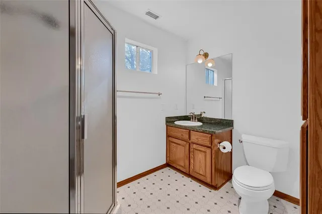 a view of a hallway with a fan