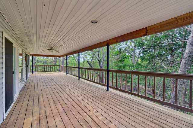 a view of backyard with large windows