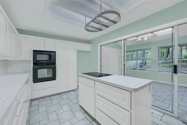 a kitchen with a stove and a sink