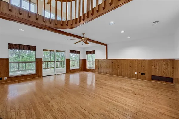 a view of a livingroom with wooden floor