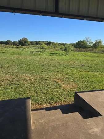 a view of an outdoor space with a lake view