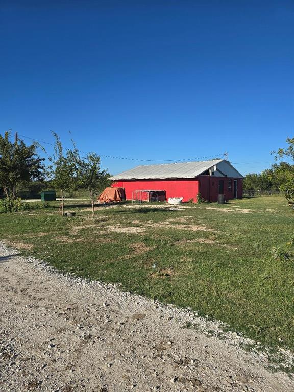 131 Hcr 1417 Covington, TX 76636 - Photo 4 of 17 a view of an outdoor space with a lake view