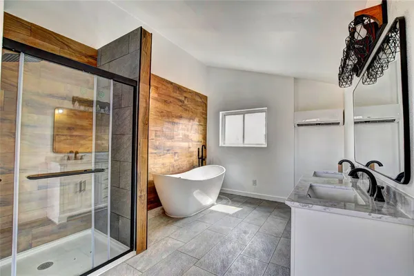a bathroom with a toilet a sink and a mirror