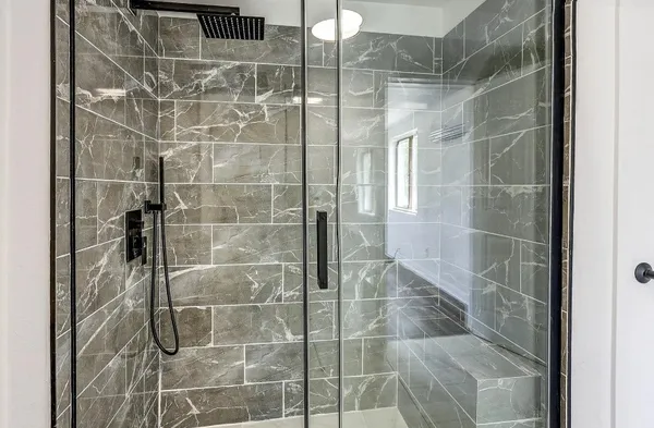 a white bath tub sitting in a bathroom
