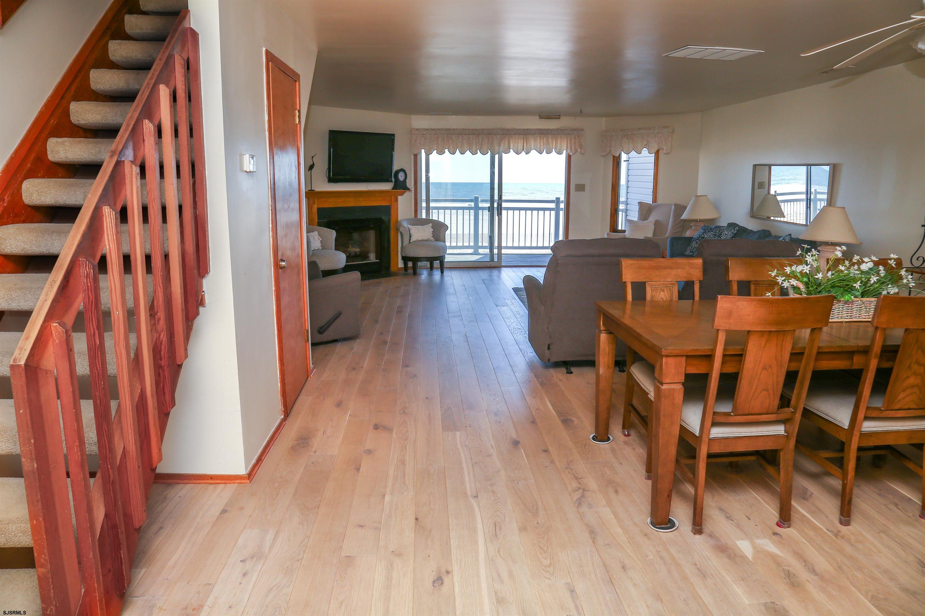 512 East Brigantine Avenue, Unit 512 Brigantine, NJ 08203 - Photo 22 of 46 a dining room with furniture and wooden floor