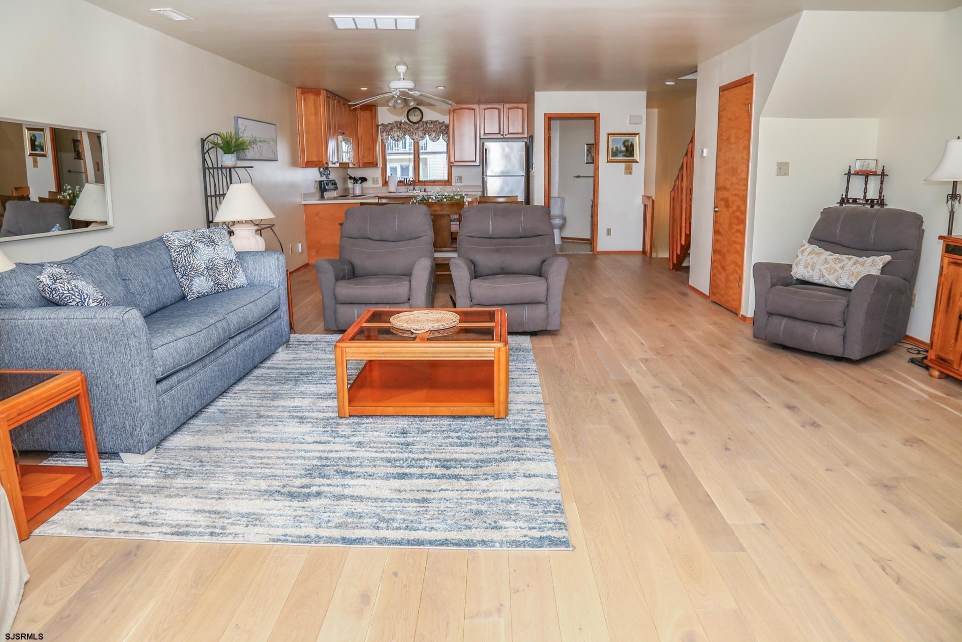 512 East Brigantine Avenue, Unit 512 Brigantine, NJ 08203 - Photo 27 of 46 a living room with furniture and a wooden floor