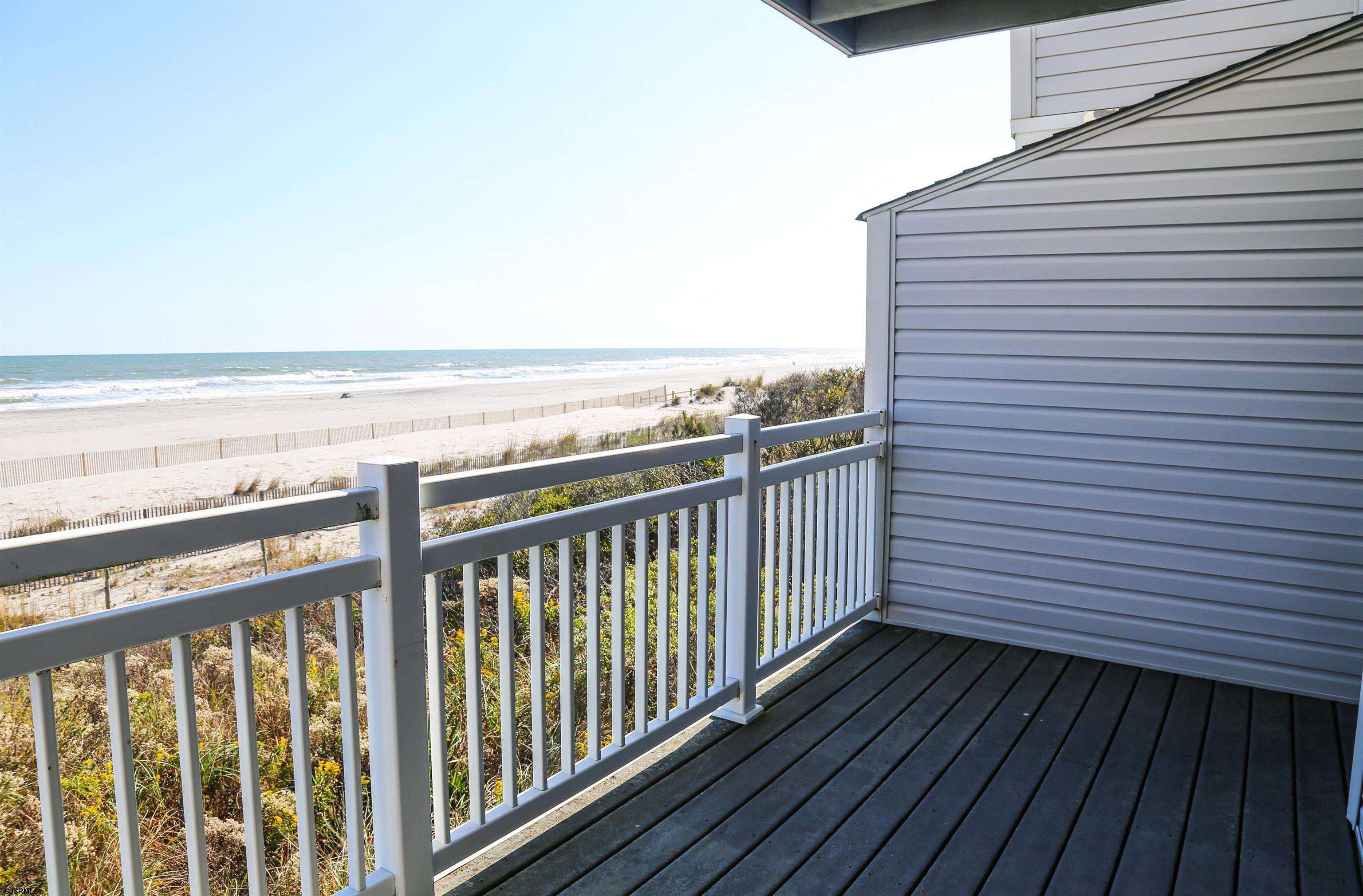 512 East Brigantine Avenue, Unit 512 Brigantine, NJ 08203 - Photo 32 of 46 a view of a balcony with wooden floor