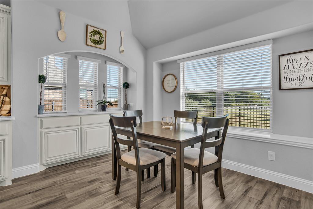 1566 Harrison Circle Waxahachie, TX 75165 - Photo 22 of 38 a view of a dining room with furniture and window