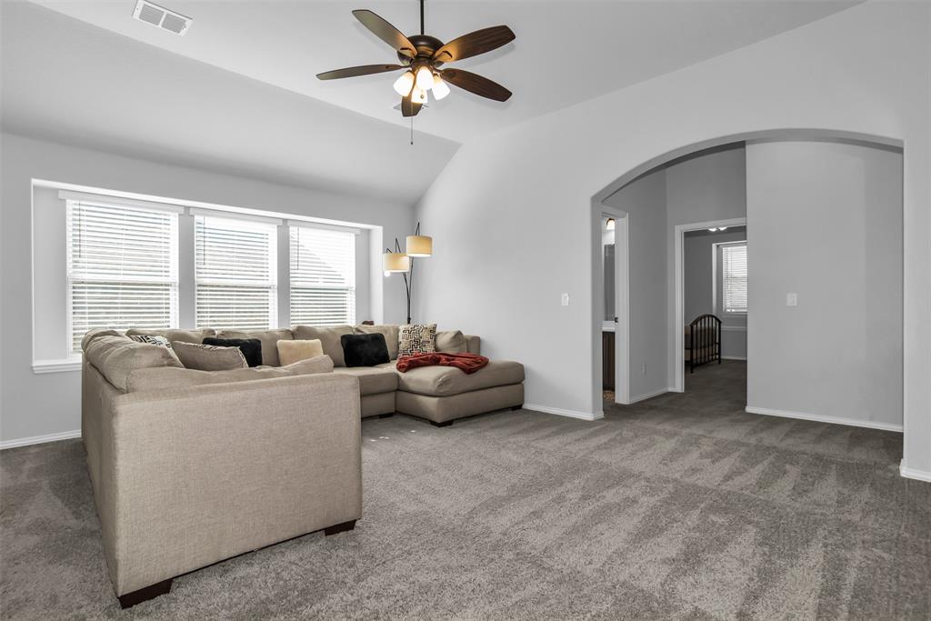 1566 Harrison Circle Waxahachie, TX 75165 - Photo 28 of 38 a living room with furniture and a large window