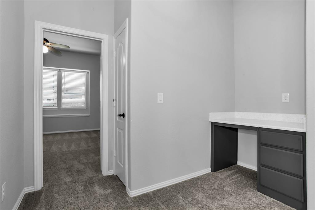 1566 Harrison Circle Waxahachie, TX 75165 - Photo 30 of 38 a view of an empty room with closet and a bathroom