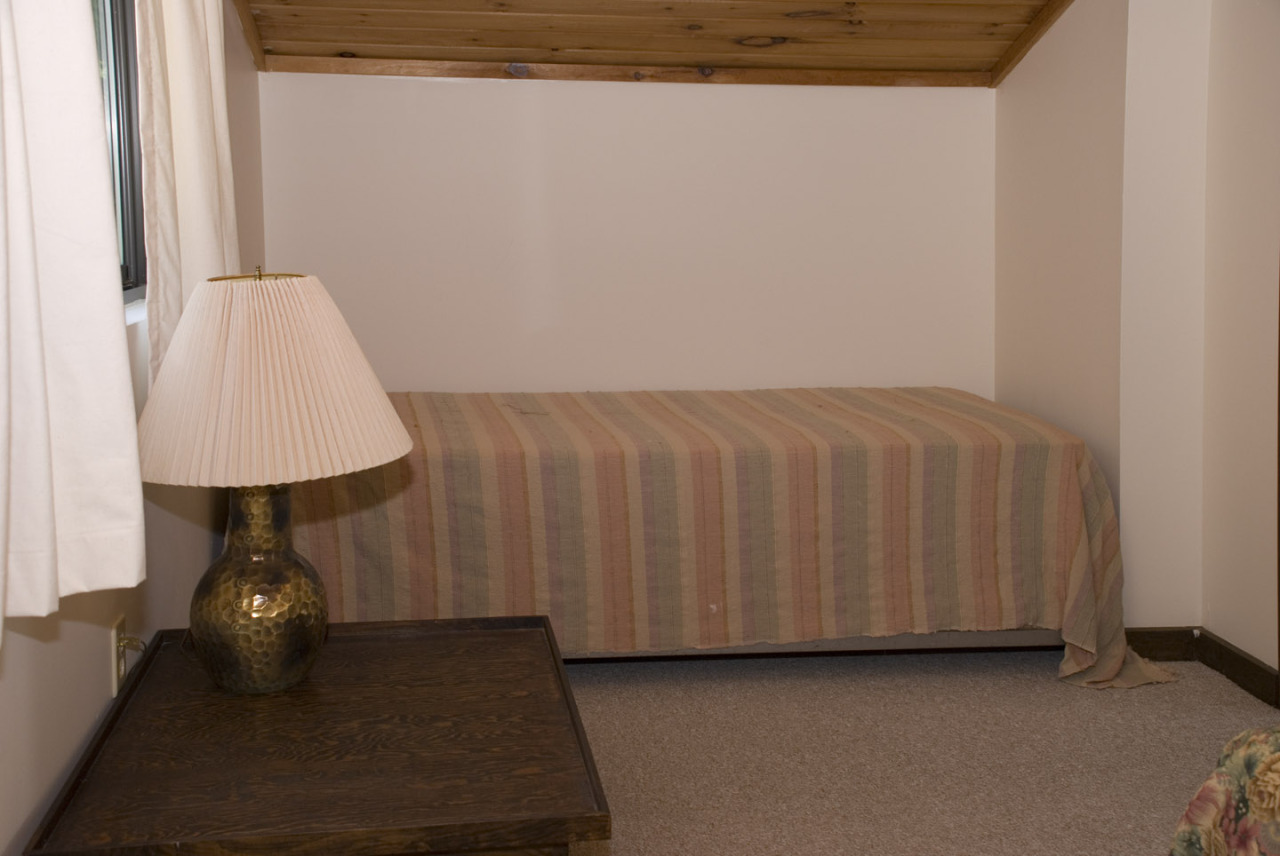 77 Stebbins Road Otis, MA 01253 - Photo 16 of 17 a view of a room with a wooden floor and a window