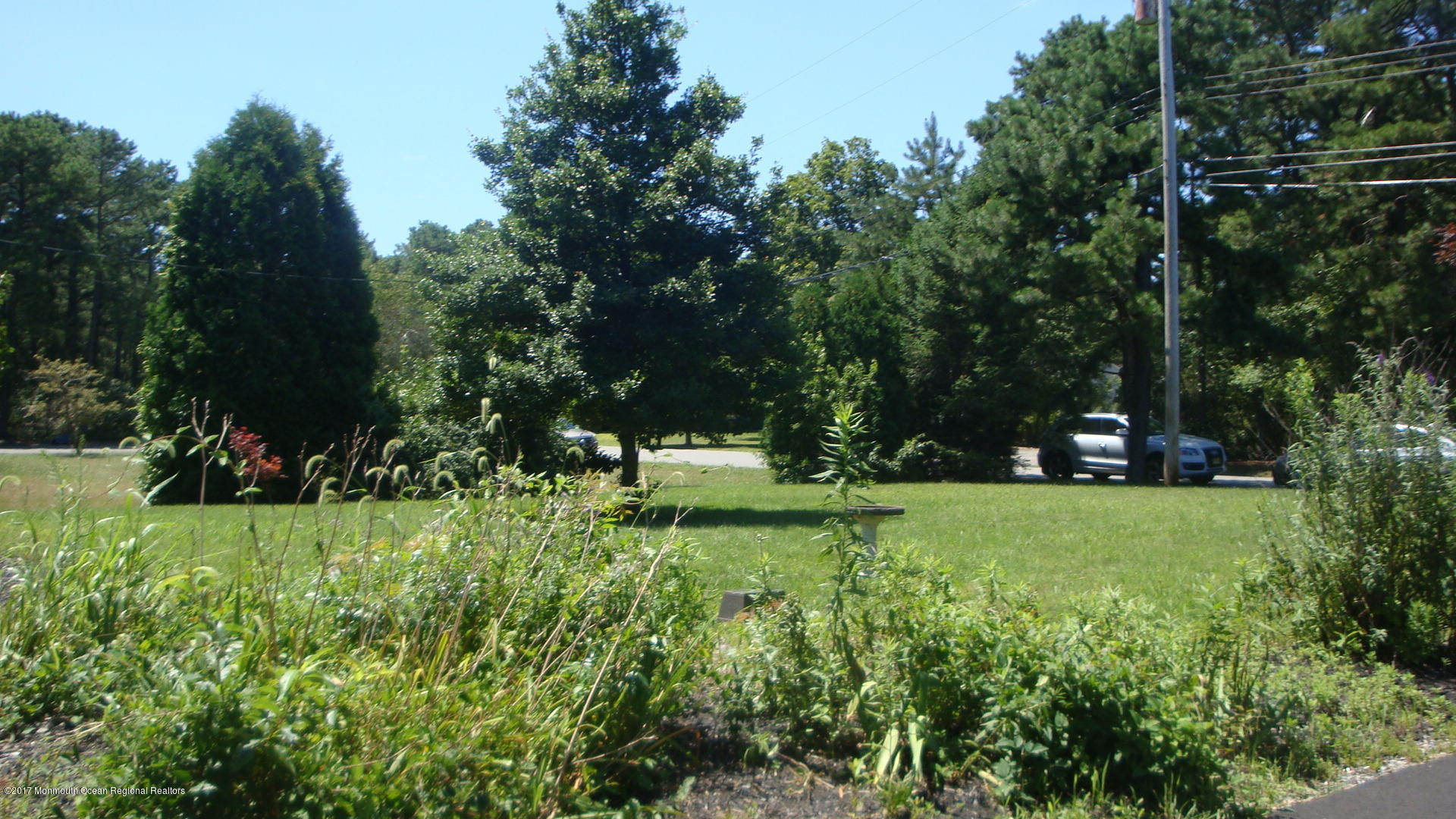 2323 Maple Road Forked River, NJ 08731 - Photo 16 of 23 a view of a garden