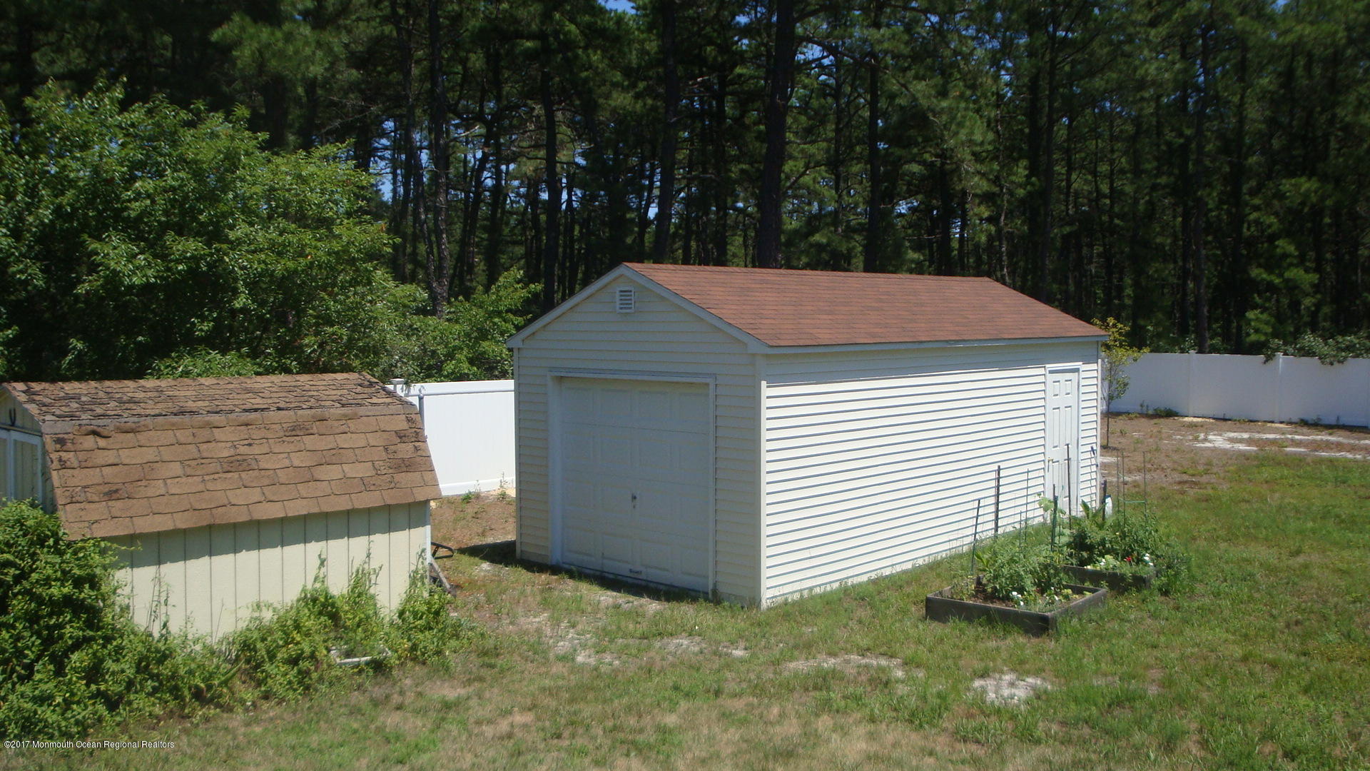 2323 Maple Road Forked River, NJ 08731 - Photo 18 of 23 a view of a backyard of the house