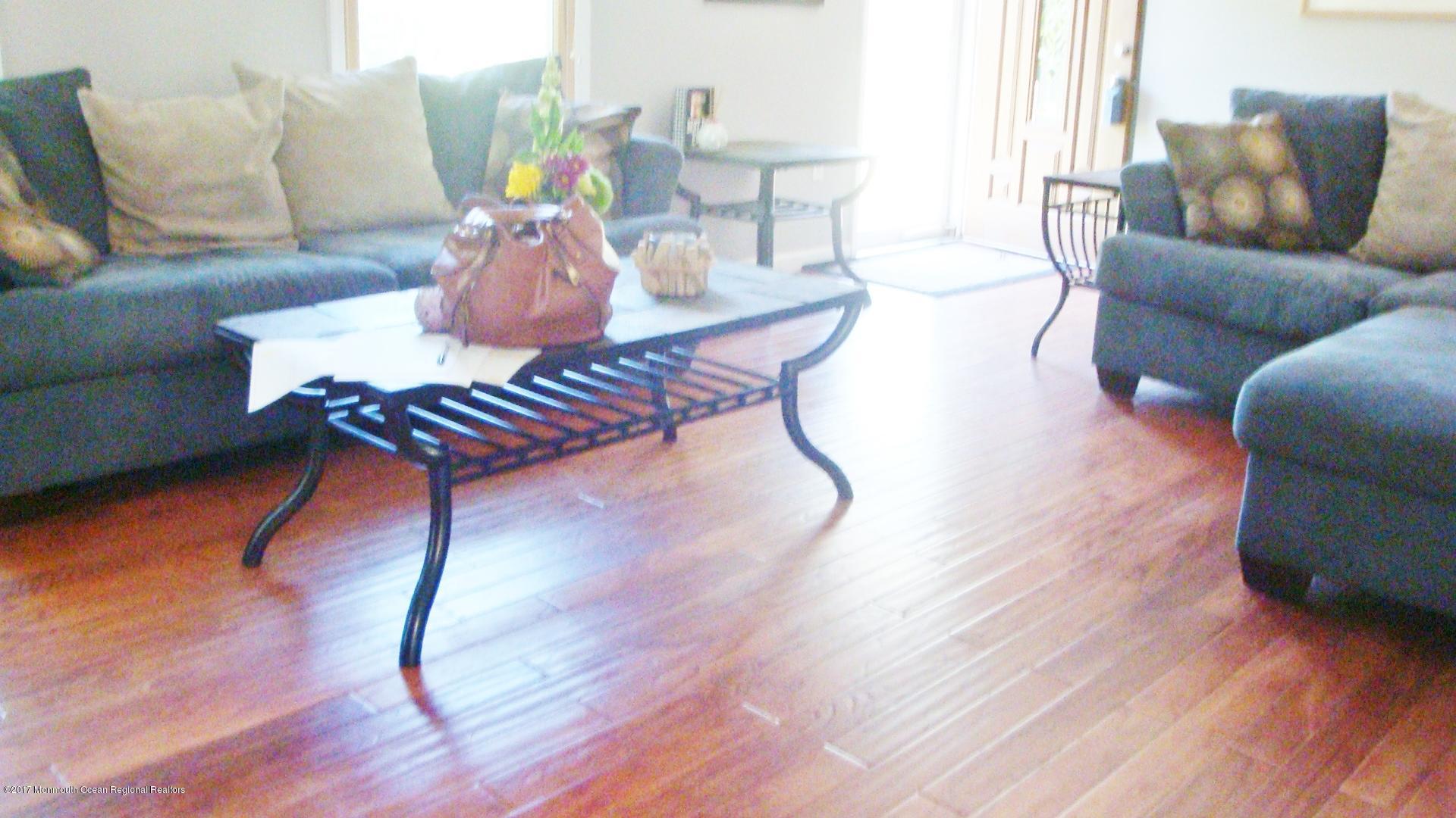 2323 Maple Road Forked River, NJ 08731 - Photo 8 of 23 a living room with furniture and wooden floor