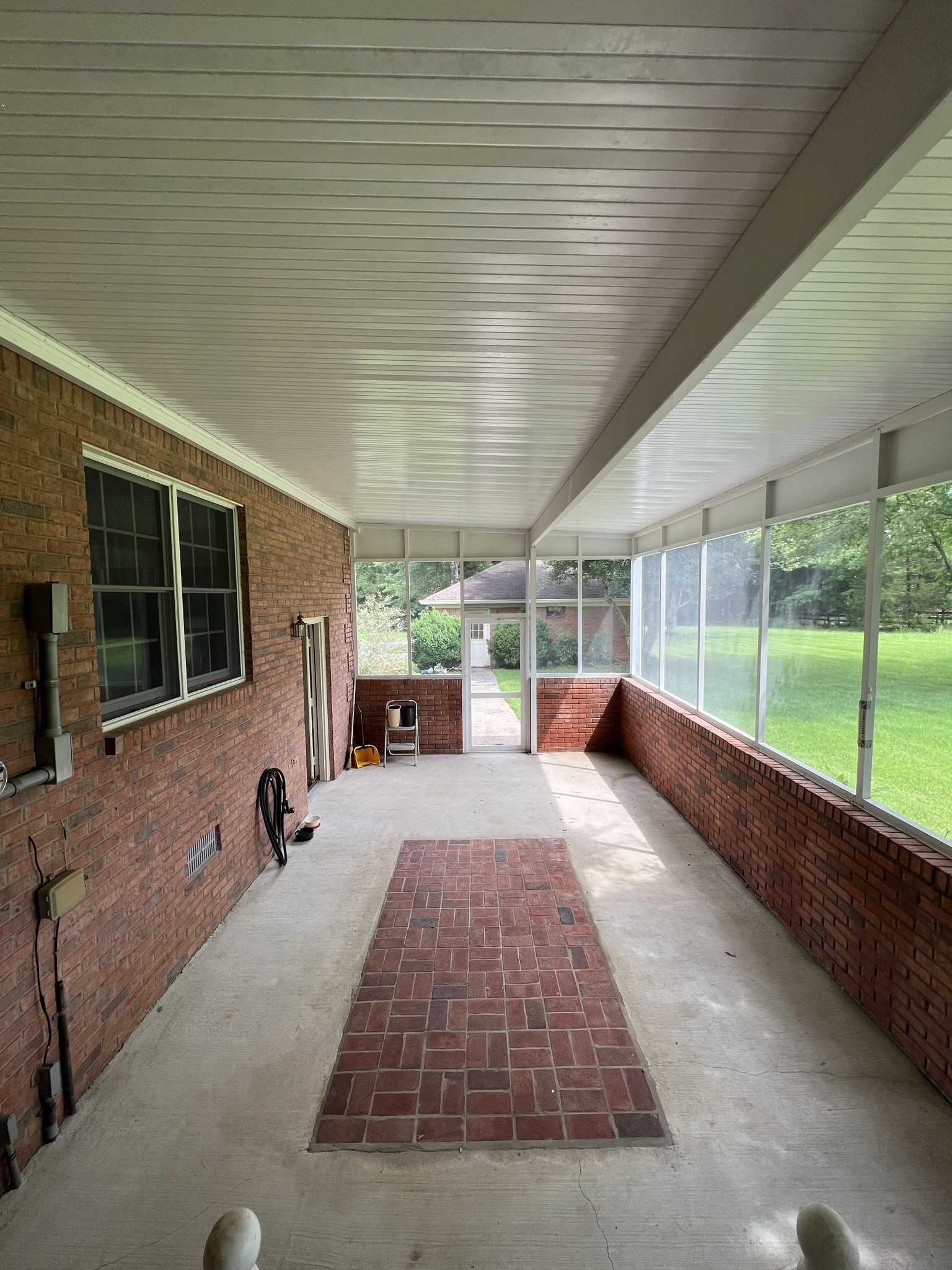 584 Corinth Road Portland, TN 37148 - Photo 13 of 42 a view of a porch and garden
