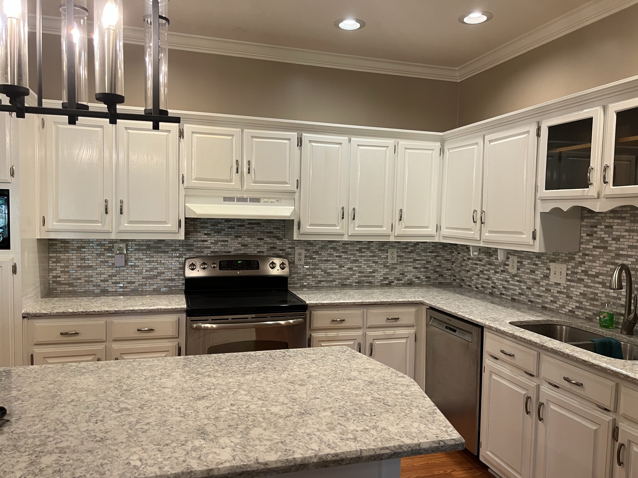 584 Corinth Road Portland, TN 37148 - Photo 25 of 42 a kitchen with granite countertop a sink and cabinets