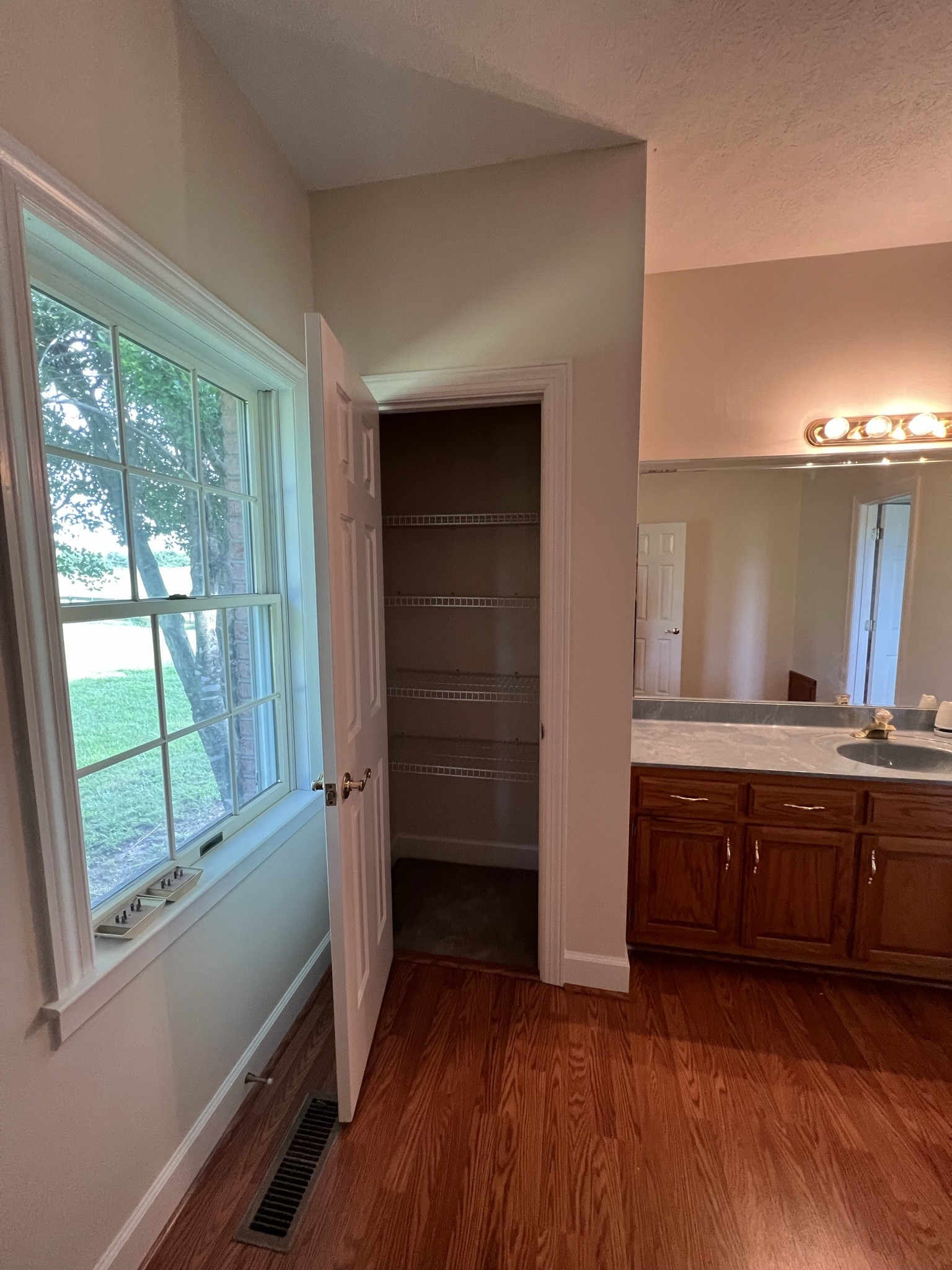 584 Corinth Road Portland, TN 37148 - Photo 34 of 42 a view of a room with wooden floor and cabinet
