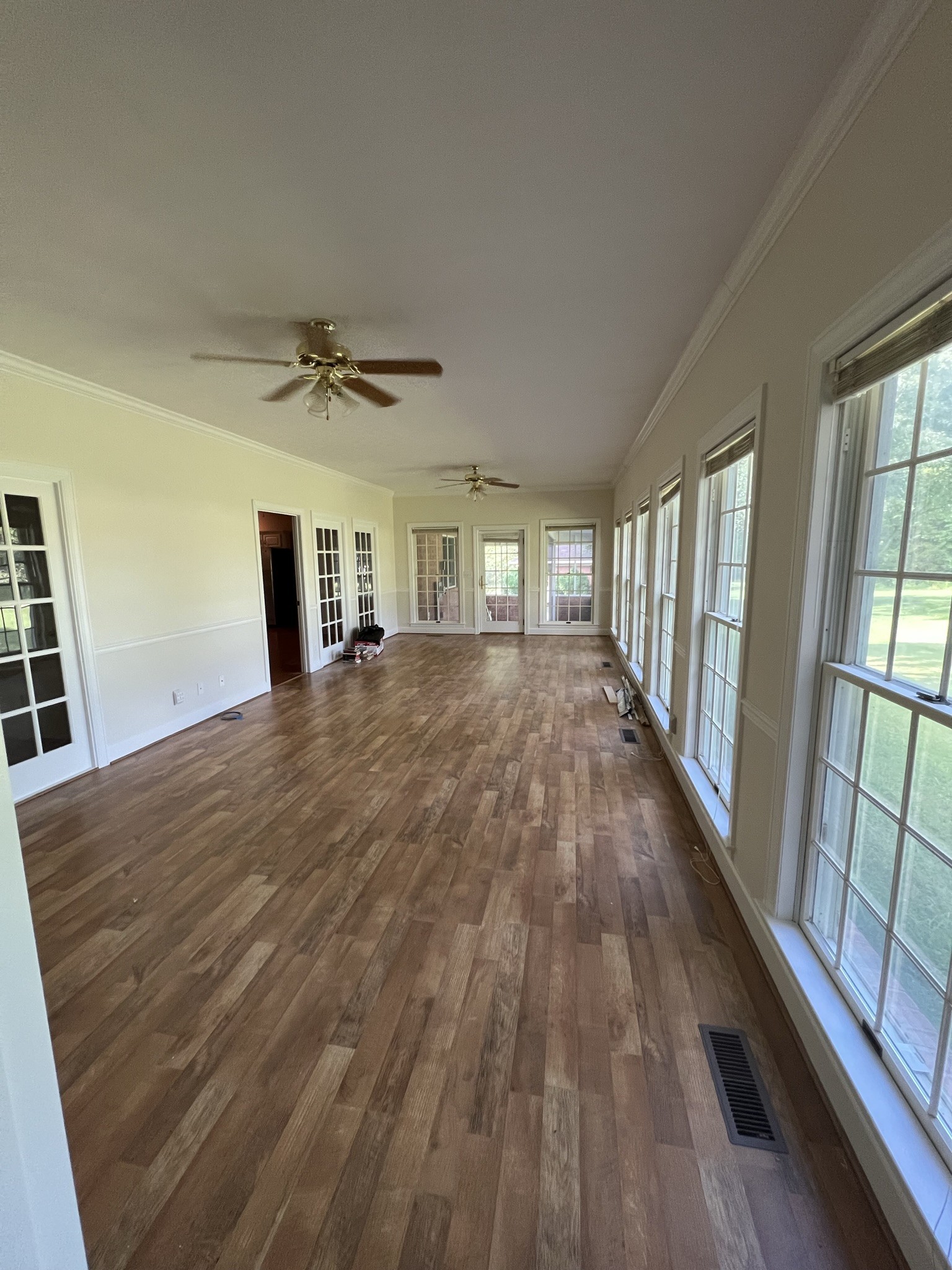 584 Corinth Road Portland, TN 37148 - Photo 35 of 42 wooden floor in an empty room with a window