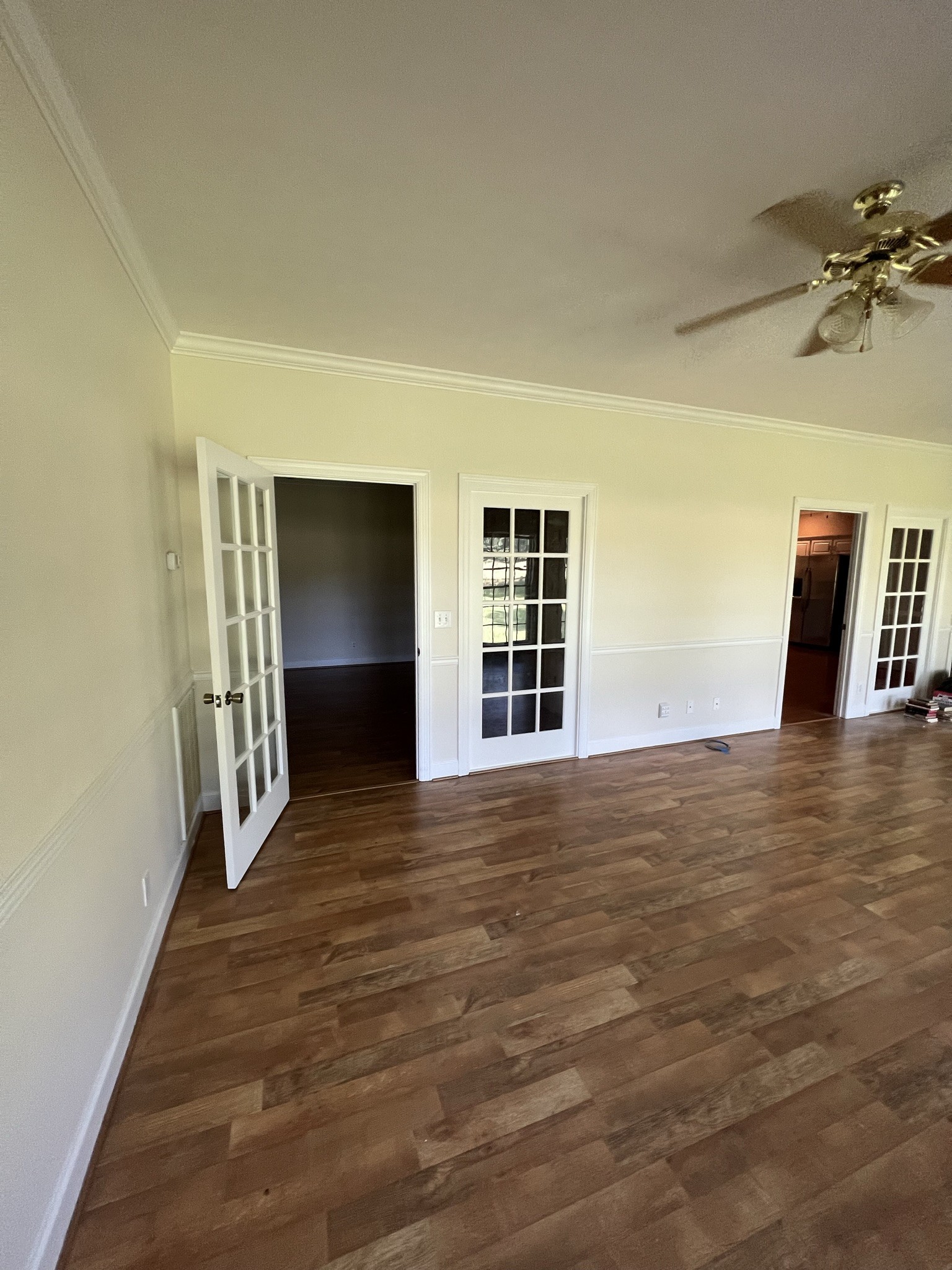 584 Corinth Road Portland, TN 37148 - Photo 36 of 42 a view of an empty room with wooden floor and a window