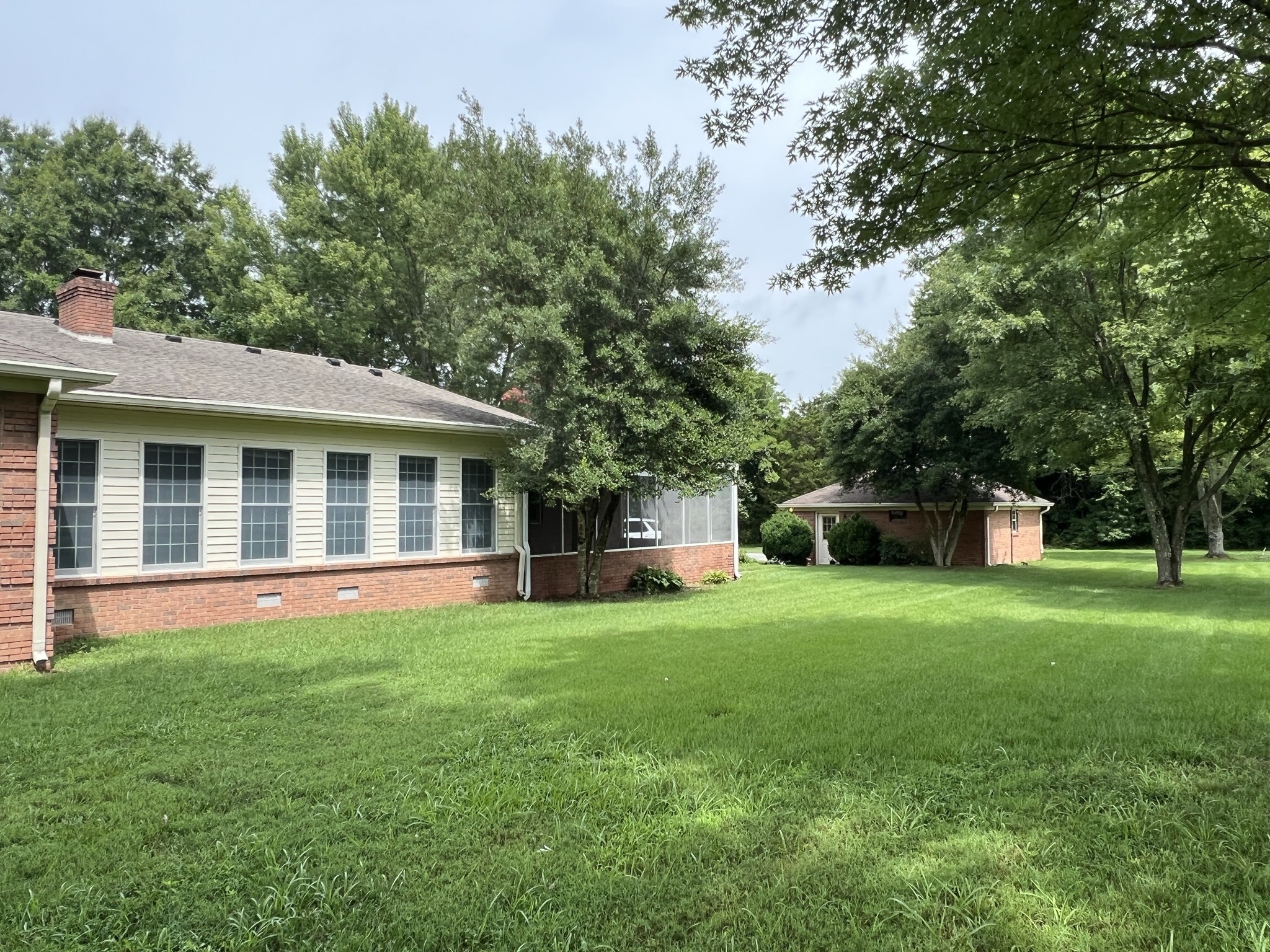 584 Corinth Road Portland, TN 37148 - Photo 10 of 42 a view of a house with a yard and sitting area