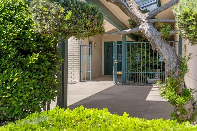 a house view with a garden space
